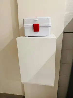 a white briefcase sitting on top of a white shelf at Jardin Yves Appartement 2 Chambres Chic in Marrakech