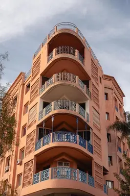 a building with balconies on the side of it at LUXURY apartment in Marrakech