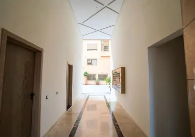 a hallway of a building with a ceiling at Appart vacance safaa in Marrakech
