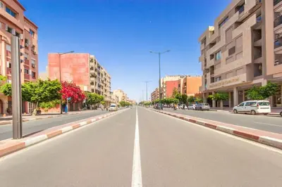 an empty street in a city with buildings at New! Guéliz , Modern , Terrasse in Marrakech