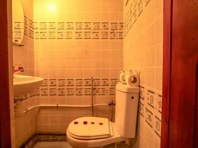 a bathroom with a toilet and a sink at Pretty Apartment in the Medina in Marrakech