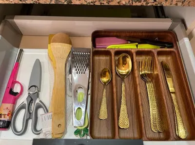 a drawer filled with utensils and spoons at Yumo: The Cozy One in Marrakech