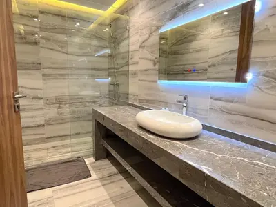a bathroom with a sink and a mirror at Palais Thami in Marrakech