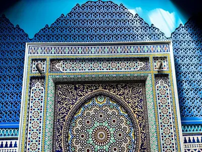 a blue and white building with a large doorway at Riad & Spa Stella Cadente Marrakech in Marrakech