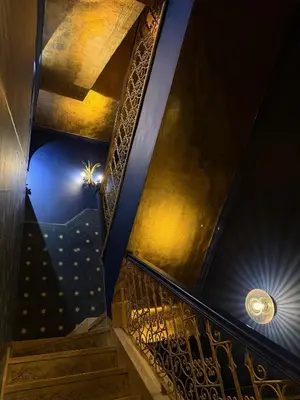 a staircase in a building with lights on the ceiling at Riad & Spa Stella Cadente Marrakech in Marrakech