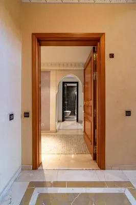 an open door to a hallway in a building at Appartement Haut standing Gueliz Plaza in Marrakech