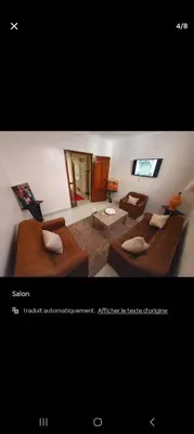 a living room with two couches at Riad Le Petit Cactus -Familial et Privatif- in Marrakech