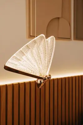 a white paper butterfly on top of a counter at Villa Ayani in Marrakech