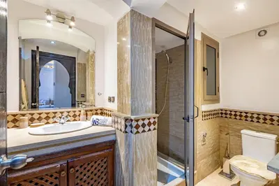 a bathroom with a sink and a shower at New, Appartement Miramas à Gueliz,en plein centre ville in Marrakech