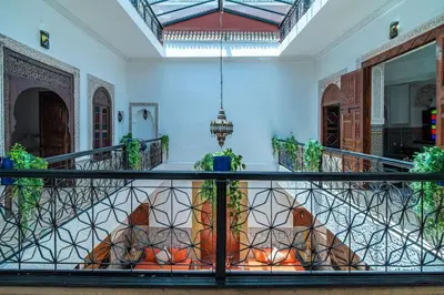 a balcony with a gate in a house at Riad Khadoj-Marrakech-Traditional in Marrakech