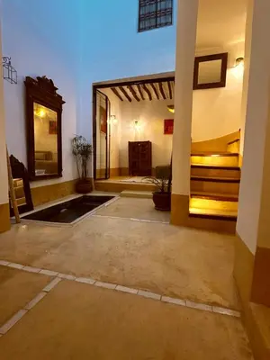 a large room with two bunk beds in it at Little 24 in Marrakech