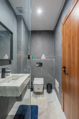 a bathroom with a sink and a toilet at Beau Studio au hub de Gueliz in Marrakech