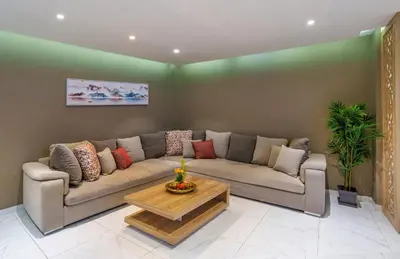 a living room with a couch and a coffee table at Luxury studio Center Gueliz in Marrakech