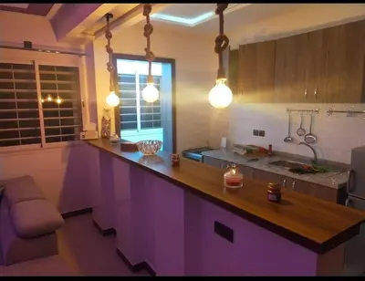 a kitchen with a purple counter top and a window at Appartement de luxe à louer in Marrakech