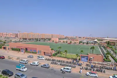 a large group of motorcycles parked in a parking lot at The Skyline Stay in Marrakech