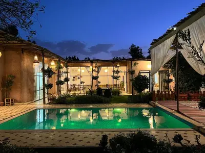 a swimming pool in the backyard of a house at La villa Berbère - Famille uniquement in Marrakech