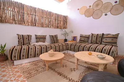 a living room with a couch and a table at Oasis Medina Hostel in Marrakech