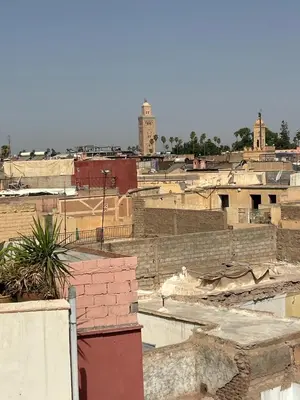 a view of a city with buildings at Riad Amazing Amazigh avec jacuzzi petit déjeuner compris avec aussi chambres familiales près de la place jemaa El fna in Marrakech