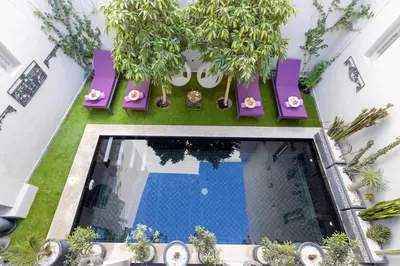 an aerial view of a house with a pool and plants at Riad Sybil Boutique Hotel in Marrakech