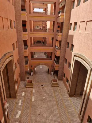 an overhead view of a building with a hallway at Appartement babylon 2 marrakech in Marrakech