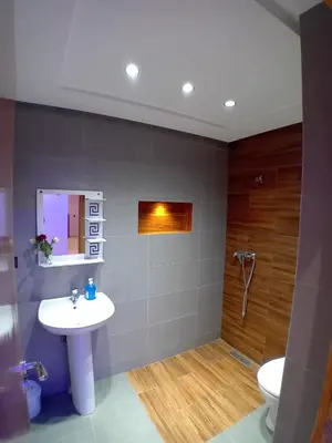 a bathroom with a sink and a toilet at Beautiful Apartment Near Airport in Marrakech