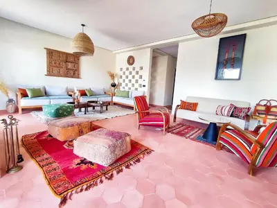 a living room filled with lots of furniture at Domaine Homa Marrakech in Marrakech