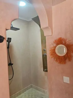 a bathroom with a shower in a room at Riad LALLA JIHANE in Marrakech