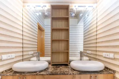 two sinks in a bathroom with two mirrors at Peaceful Marrakech Villa 4 Bedrooms Private Pool in Marrakech