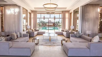 a large living room with couches and a table at Luxury Villa Rêve D'ahlam à MARRAKECH in Oulad Boudene