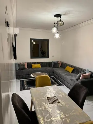 a living room with a couch and a table at Marrakech top 1 in Marrakech