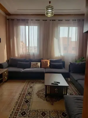 a living room with a couch and a coffee table at Marrakesh 3 Bedroom Oasis in Marrakech