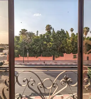 a view of a street from a balcony at Apartement Panoramic View Majorelle Garden with Pool in Marrakech