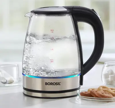 a blender filled with water on top of a counter at Modern family apartment near airport in Marrakech