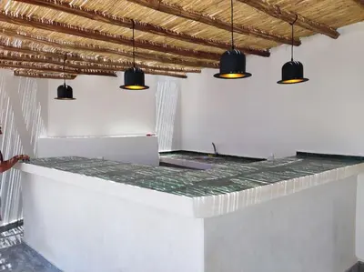 a counter in a room with lights on it at Riad White Cactus in Marrakech