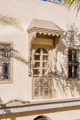 a window on the side of a building at Suites & Spa - Riad XO in Marrakech