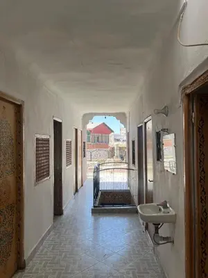 an empty hallway with a sink and a sink at DarYOUSSEF 68 in Marrakech