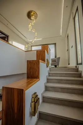 a staircase in a house with a stair case at AD Villa in Marrakech