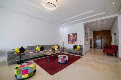 a living room with a couch and a table at Villa in Marrakesh in Marrakech