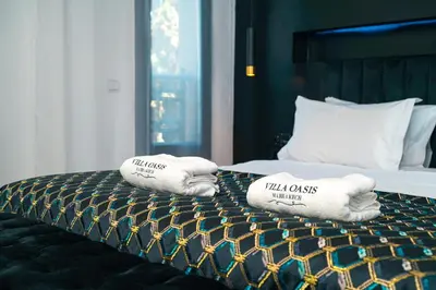 a hotel room with two pillows on a bed at Villa oasis private pool secure complex in Marrakech