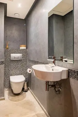 a bathroom with a sink and a toilet at Magnifique appartement Gueliz in Marrakech