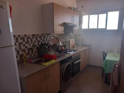 a kitchen with a sink and a dishwasher at Apartment - Sleeps up to 8 & parking in Marrakech