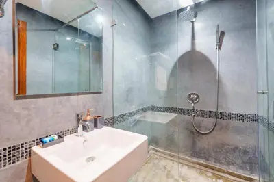 a bathroom with a sink and a shower at Menara garden in Marrakech