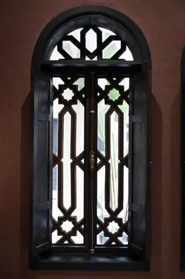 an ornate window in a room with at Alrashid Marrakech Boutique Hotel & SPA in Marrakech