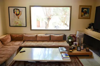 a living room with a couch and a coffee table at Villa Tulum - Indoor Spa & Pools in Marrakech