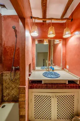 a bathroom with a sink and a mirror at Dar Karole-Privé-petits déjeuners inclus in Marrakech