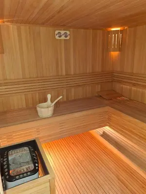 a inside of a sauna with a scale in it at Hypercentre, Cosy, 2 piscines, Sauna, Hammam in Marrakech