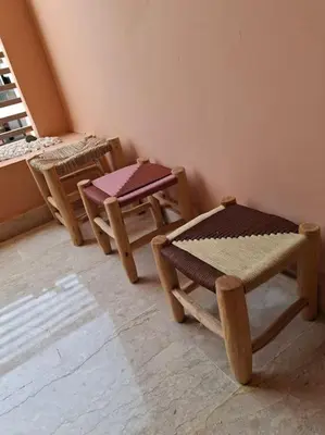 a room with two tables and chairs in a room at Hypercentre, Cosy, 2 piscines, Sauna, Hammam in Marrakech