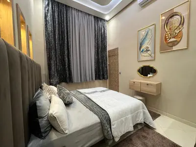 a bedroom with a bed and a window at Appartement 1 chambre in Marrakech