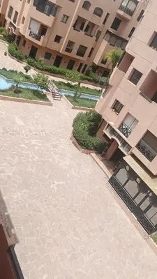 an empty courtyard in front of a building at premium village M355 in Marrakech