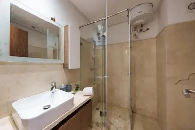 a bathroom with a sink and a shower at Red appart in Marrakech
